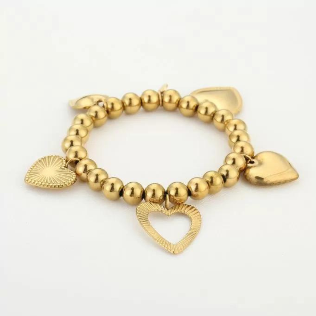 Gouden bedelarmband met hartjes