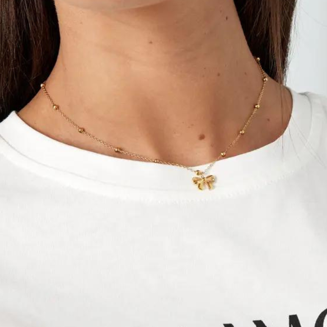 Gouden ketting met strikje
