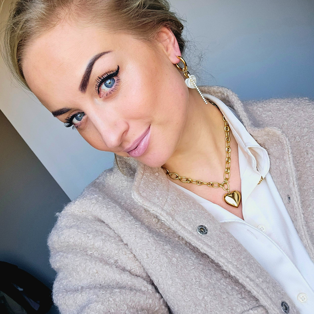 Gouden oorbellen met hart parel en steentjes