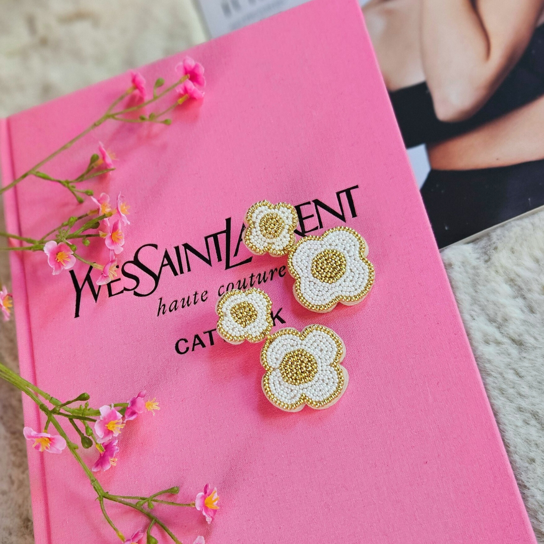 Gouden bloem statement oorbellen