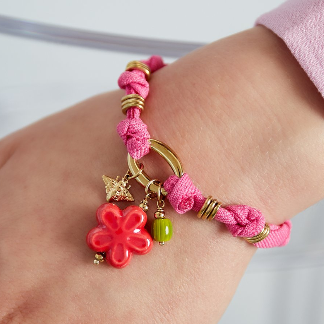 Flower armband fuchsia