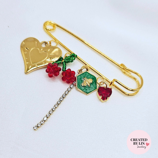 Broche kers🍒