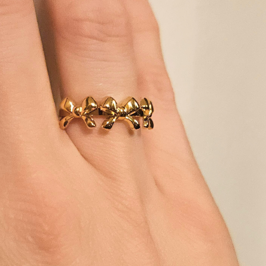 Strikjes ring goud