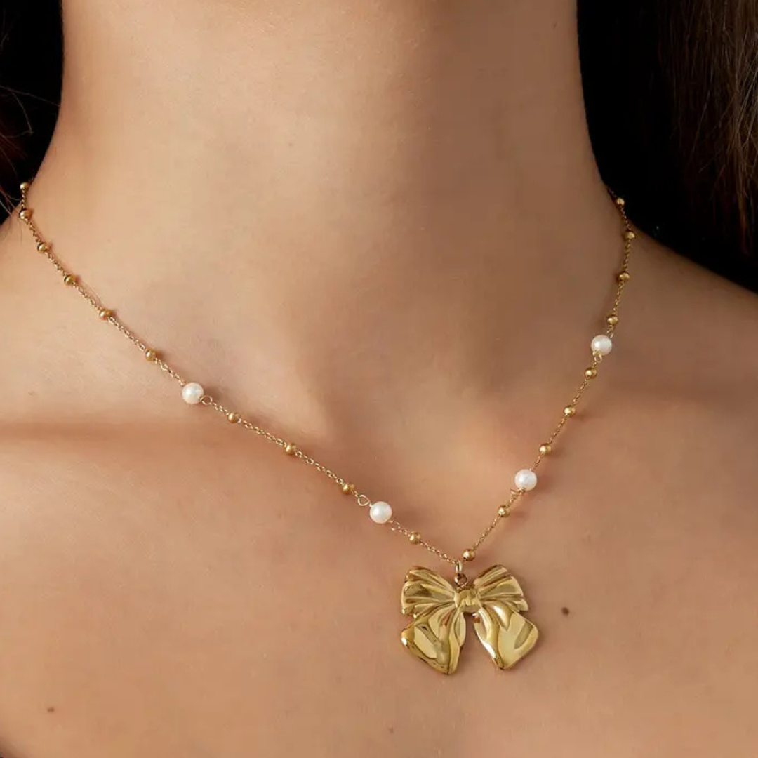 Ketting baby bow goud