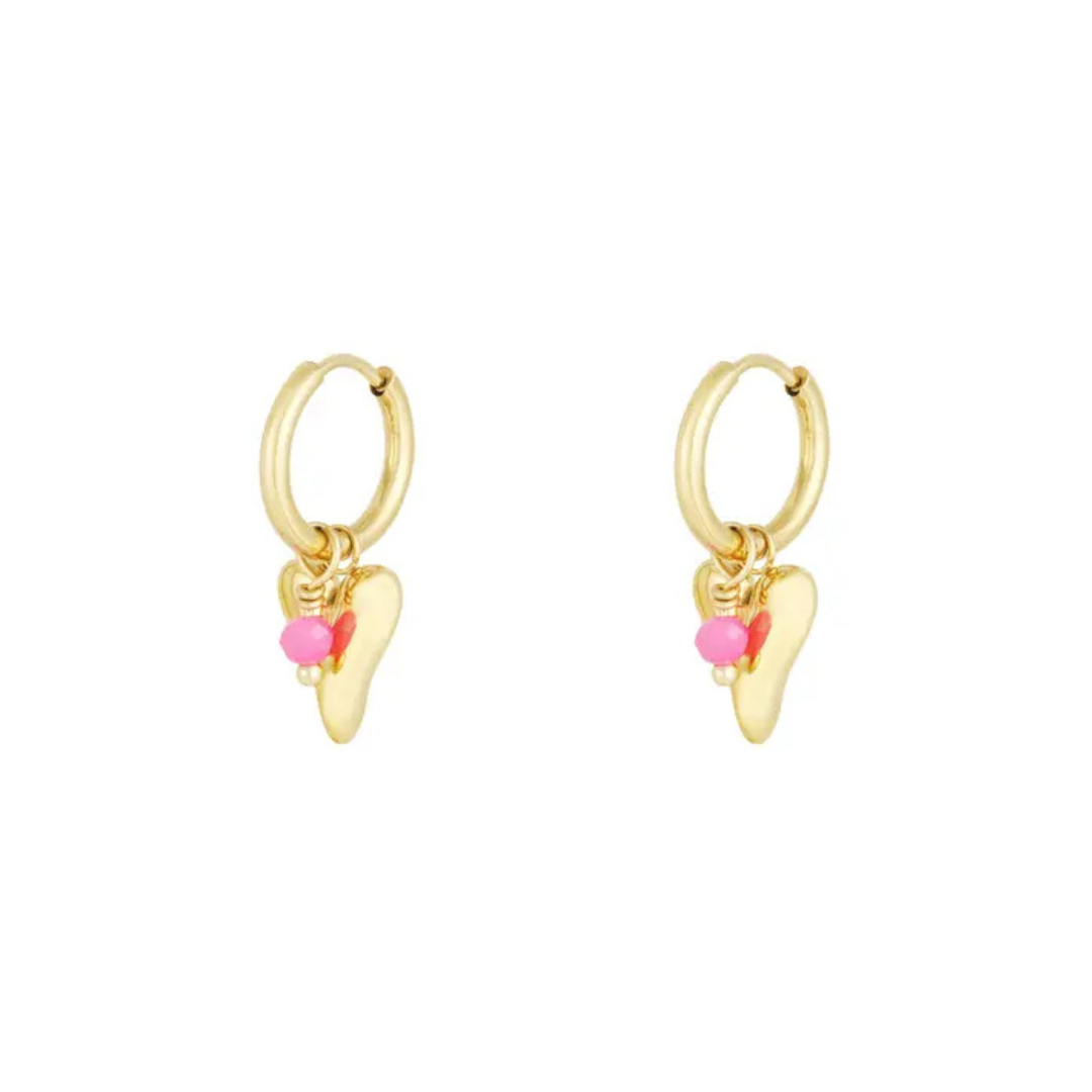 Kleine gouden hartjes oorbellen roze