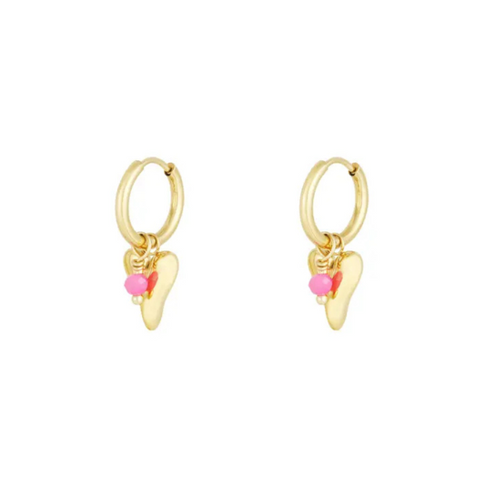 Kleine gouden hartjes oorbellen roze
