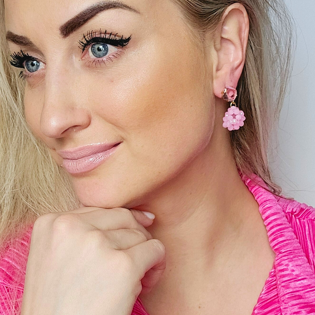 Roze oorbellen met kraaltjes