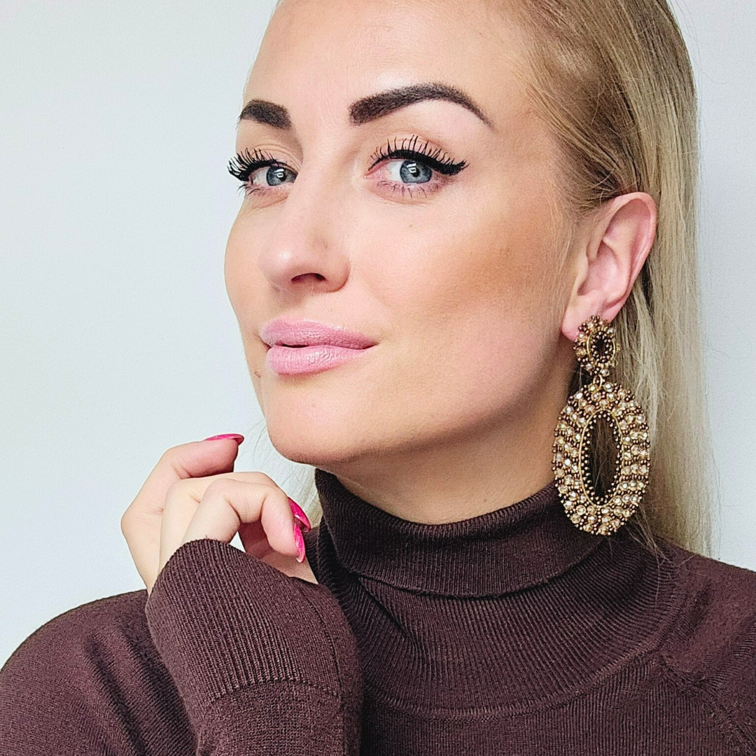 Ovale statement oorbellen beige