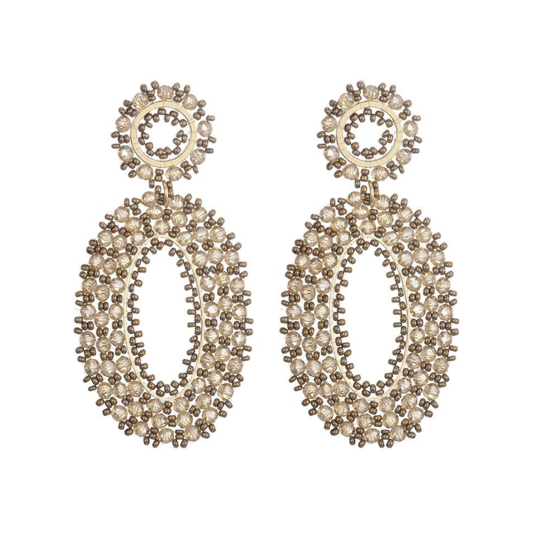 Ovale statement oorbellen beige